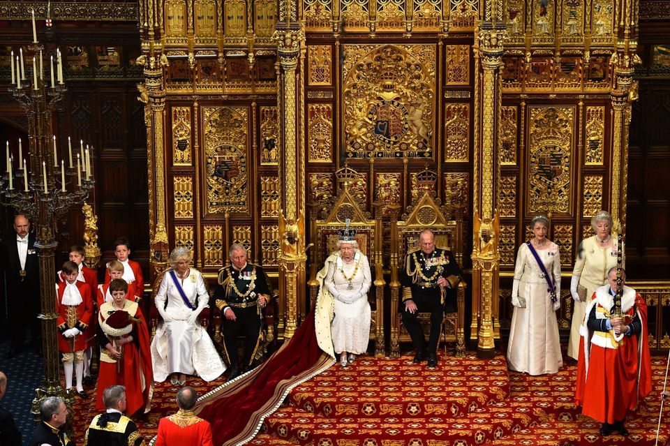 The Queen sat on the throne in the House of Lords next to Prince Philip, Prince Charles and the Duchess of Cornwall 