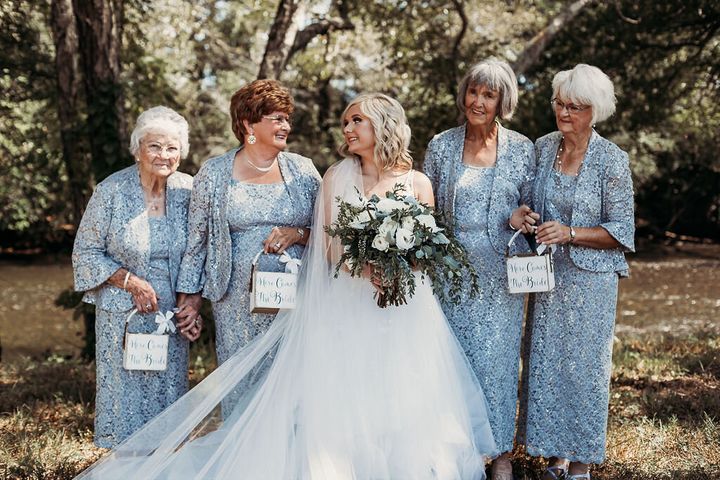 The grandmas carried little flower petal baskets that said, "Here comes the bride."