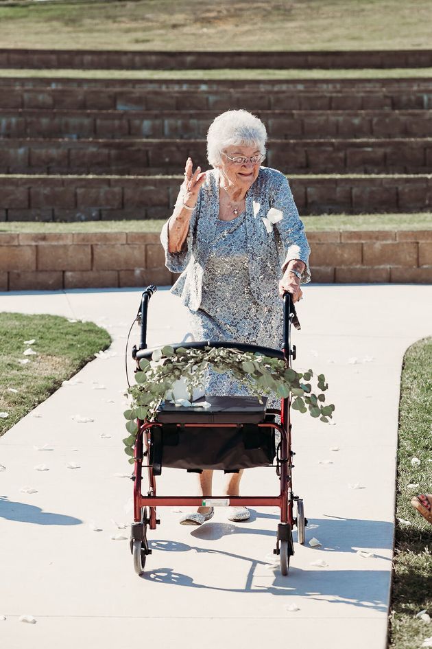 The bride's great-grandmother Kathleen Brown tossing some flower petals. 