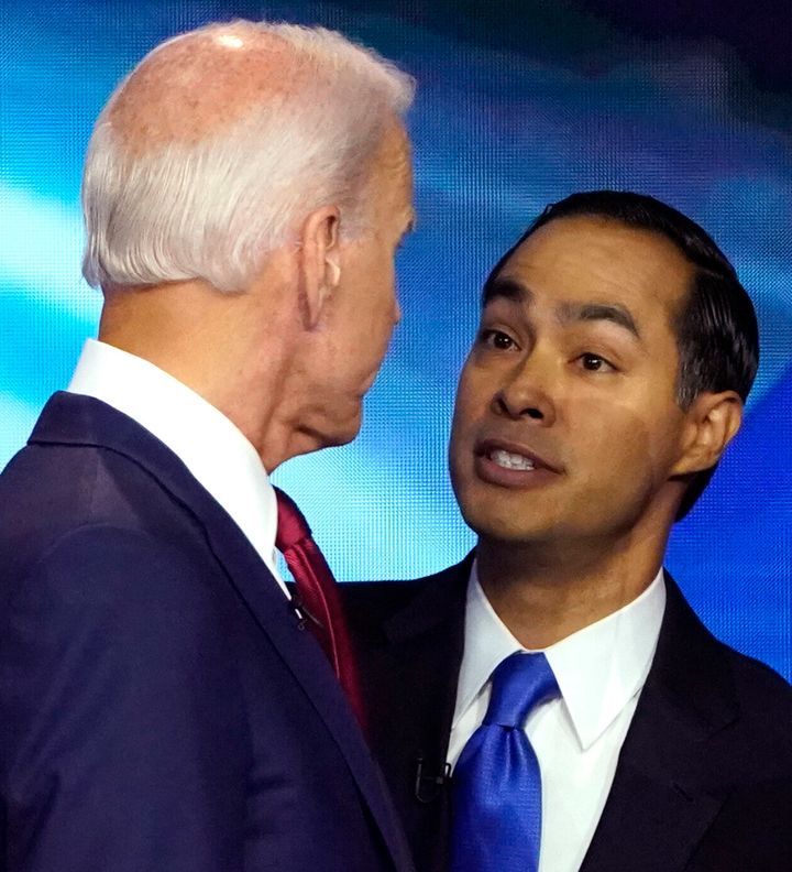 Joe Biden and Julian Castro talk after the Democratic debate on Sept. 12 in Houston, where the pair clashed over health care.