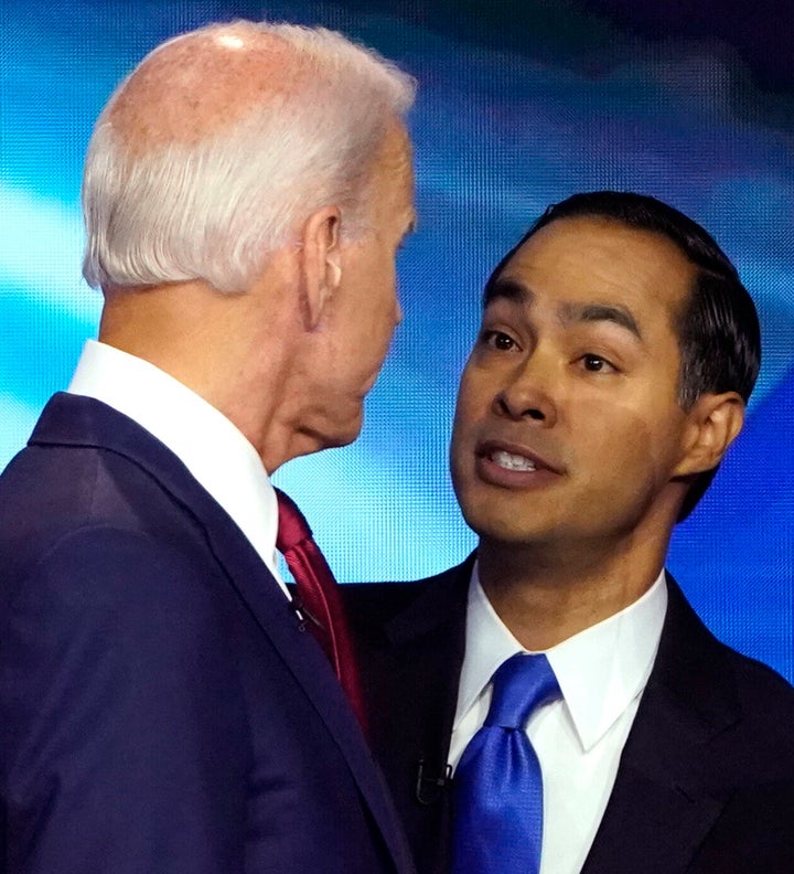 Joe Biden and Julian Castro talk after the Democratic debate on Sept. 12 in Houston, where the pair clashed over health care.