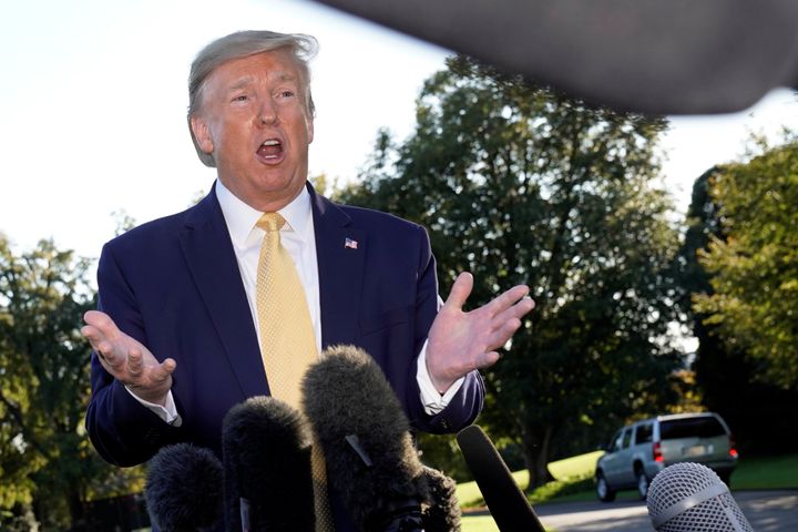 Donald Trump speaks to the media on the South Lawn of the White House in Washington, US, before his departure to deliver remarks at a Keep America Great Rally in Lake Charles, Louisiana, October 11.