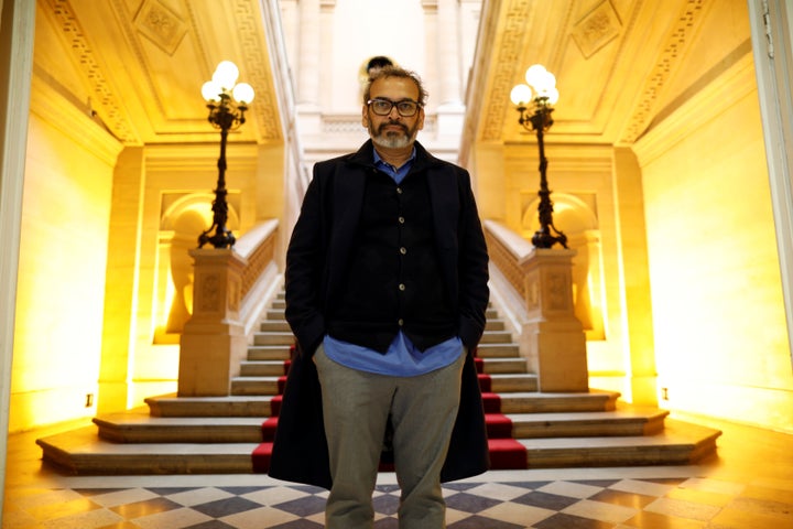 Indian contemporary artist Subodh Gupta poses before the opening of his retrospective exhibition Adda/Rendez-vous at the Monnaie de Paris (Paris Mint) in Paris, France, April 5, 2018. REUTERS/Charles Platiau