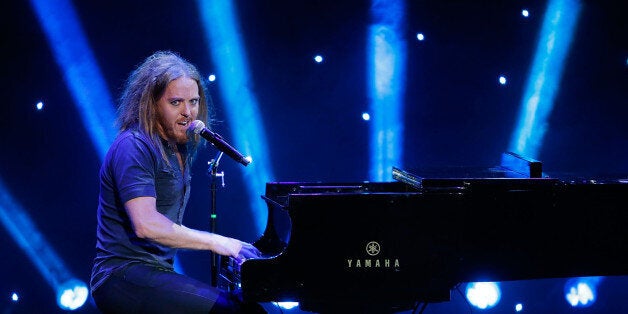 LOS ANGELES, CA - APRIL 05: Tim Minchin performs onstage at the KROQ 106.7 FM Kevin & Bean's April Foolishness 2014 at The Shrine Auditorium on April 5, 2014 in Los Angeles, California. (Photo by Joe Scarnici/Getty Images)Tim M