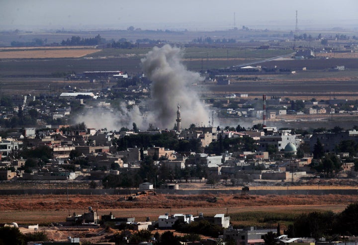 In this photo taken from the Turkish side of the border between Turkey and Syria, in Ceylanpinar, Sanliurfa province, southea
