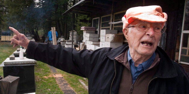 Vladimir Katriuk points at his honeybee farm in Ormstown, Que., Wednesday, April 25, 2012. Katriuk, alleged to be one of the world's most-wanted Nazi war criminals, is living a quiet life keeping bees and selling honey in rural Quebec. THE CANADIAN PRESS/Ryan Remiorz