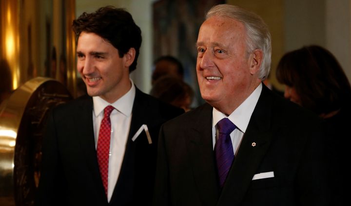 Former Canadian Prime Minister Brian Mulroney (right) and Prime Minister Justin Trudeau at a ceremony in Ottawa, Dec. 6, 2016.