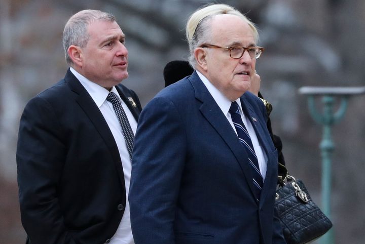 Rudy Giuliani and Lev Parnas, the Soviet-born businessman who served as Giuliani's fixer in Ukraine, arrive for the funeral of President George H.W. Bush at the National Cathedral in Washington, D.C., Dec. 5, 2018.