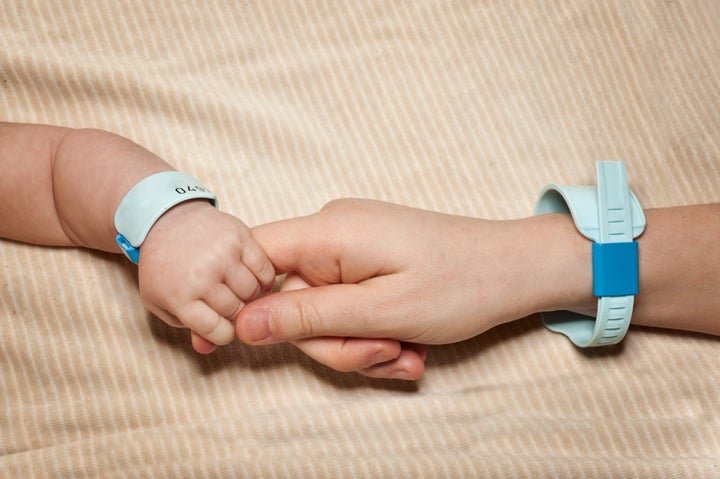 Since infant identification bracelets come in sets of threes, there are sometimes not enough to go around for groups of polyamorous parents.