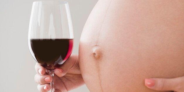 Cheers! You're pregnant - but can you drink a little?