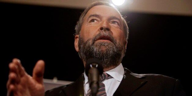 After saying he'd start attacking the Liberal record, NDP Leader Thomas Mulcair did just that Wednesday morning at his party's caucus retreat in Saskatoon, delivering a no holds barred speech painting the Grits and Tories as one and the same. (CP)