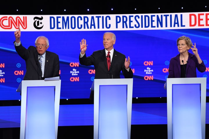 Sen. Bernie Sanders (I-Vt.), left, and Sen. Elizabeth Warren (D-Mass.) responded ferociously to criticism from former Vice President Joe Biden.