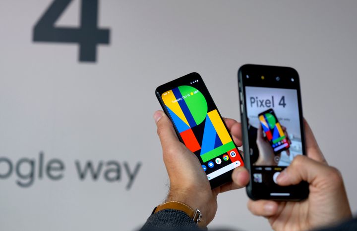 A Google Pixel 4 phone, center, is photographed at an event announcing the product Tuesday, Oct. 15, 2019, in New York. 