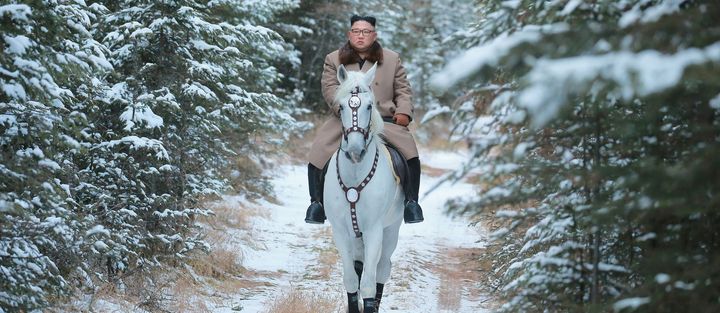 North Korean leader Kim Jong Un rides a horse during snowfall in Mount Paektu.