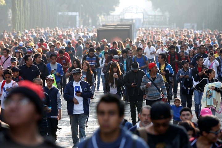 People play Pokémon Go during a gathering to celebrate "Pokémon Day" in Mexico City, Mexico, in August 2016.