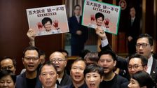 Hong Kong Lawmakers Thwart Leader Carrie Lam's Annual Speech In Chaotic Scenes