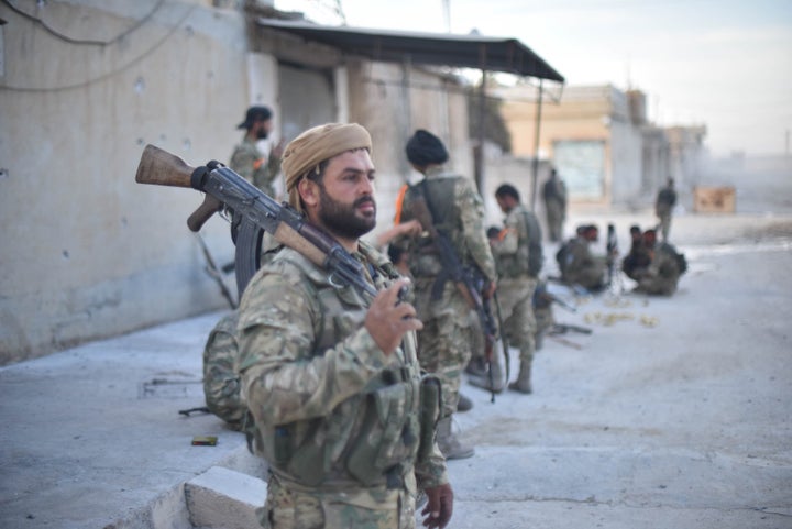 Syrian National Army (SNA) members have a rest as they launch an operation in Syria's Ras al-Ayn villages after the city center was cleared of PKK terrorists and the Syrian Kurdish YPG militia, which Turkey regards as a terror group.