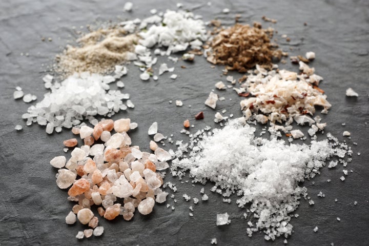 A wide variety of salts are on the market (from top, clockwise): fleur de sel, chipotle salt, hickory smoked salt, sea salt, Himalayan coarse salt, stone salt and garlic salt.