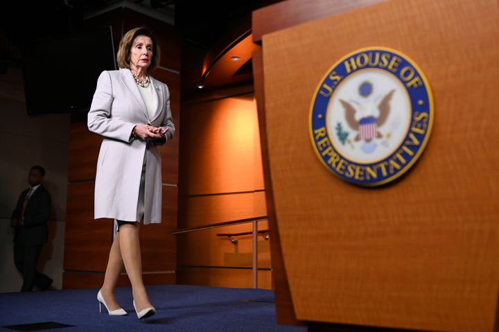 House Speaker Nancy Pelosi arrives Thursday for a news conference on Capitol Hill. She says House Democrats are on a "path to yes" on a trade deal with Canada and Mexico.