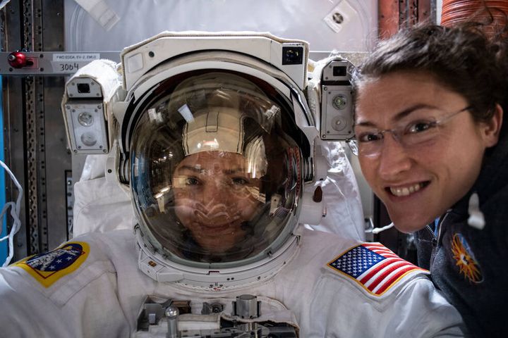 Nasa astronauts Jessica Meir (left) and Christina Koch prepare on the International Space Station for the first all-female spacewalk.