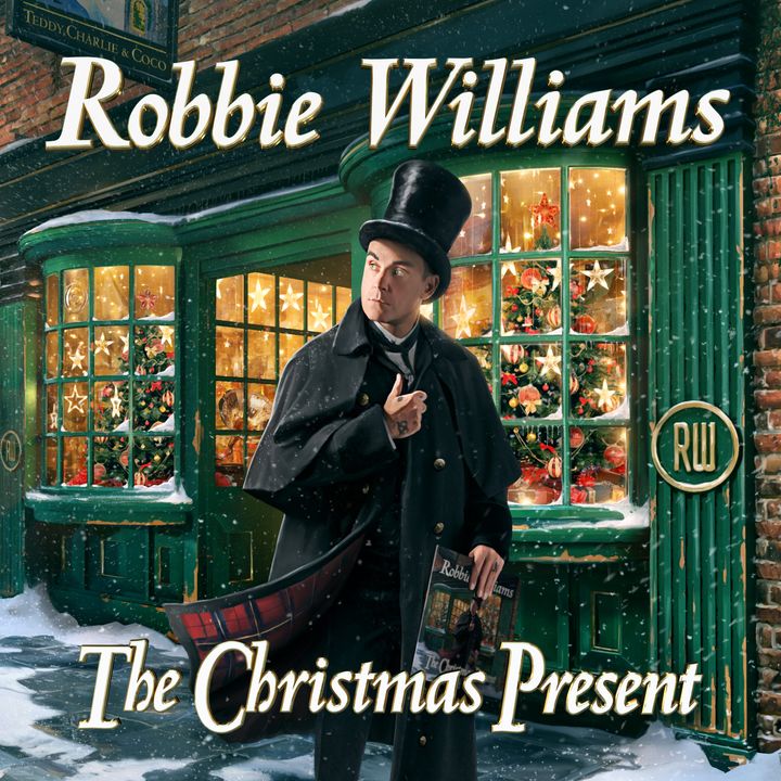 The album artwork for The Christmas Present features the names of Robbie's three children