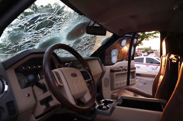 A bullet ridden vehicle remains in a street of Culiacan, state of Sinaloa, Mexico, on October 17.