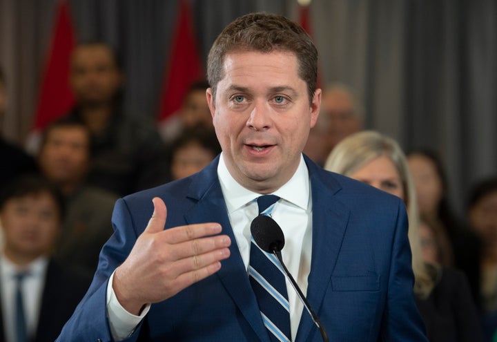 Andrew Scheer responds to questions during a campaign stop in Toronto on Oct. 19, 2019.