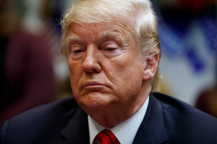 President Donald Trump pauses as he speaks with astronauts Jessica Meir and Christina Koch as they conduct the first all-female spacewalk, from the Roosevelt Room of the White House, Friday, Oct. 18, 2019, in Washington. (AP Photo/Evan Vucci)