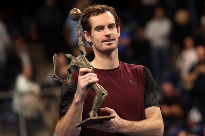 Andy Murray of Britain poses with the trophy after winning the European Open final tennis match in Antwerp, Belgium, Sunday, Oct. 20, 2019. Murray defeated Stan Wawrinka of Switzerland 3-6/6-4/6-4. (AP Photo/Francisco Seco)