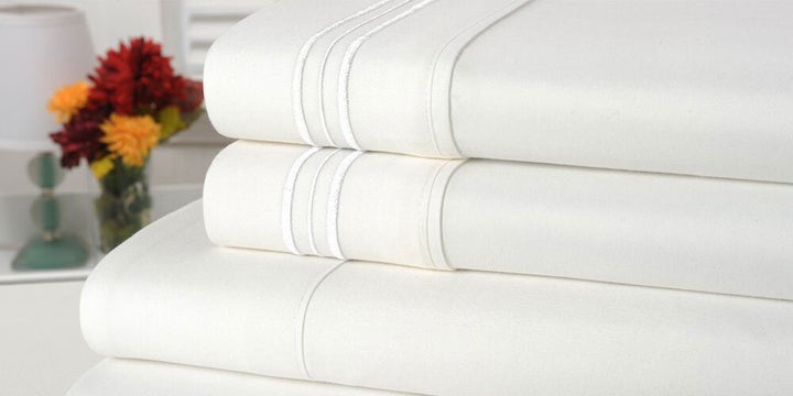 This Bamboo Comfort four-piece sheet set in the <a href="https://www.huffpoststuff.com/sales/bamboo-comfort-4-piece-solid-sheet-sets-queen-white?utm_source=huffpost.com&utm_medium=referral&utm_campaign=bamboo-comfort-4-piece-solid-sheet-sets-queen-white&utm_term=scsf-345957&utm_content=a0x1P000004MqKn&scsonar=1" target="_blank" rel="noopener noreferrer">queen size is on sale for just $33</a>.