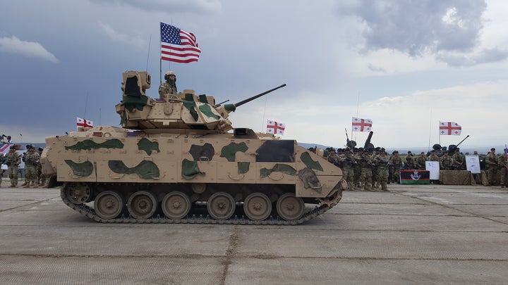 When a Bradley Fighting Vehicle, similar to the one pictured above, overturned early Sunday, three U.S. soldiers were killed.
