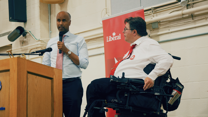 Liberal incumbent Kent Hehr, right, listens to Immigration Minister Ahmed Hussen, left. Hussen was one of several cabinet ministers who visited Calgary Centre before the writ dropped.