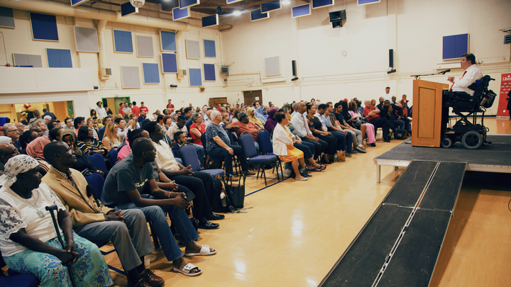 Liberal candidate Kent Hehr speaks to community residents in Calgary, July 2019.