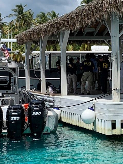 FBI agents at Little St. James Island, one of Epstein's properties, in August following his death 