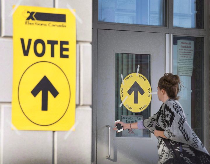 A voter enters a polling station in Vaughan, Ont. during the 2015 election.