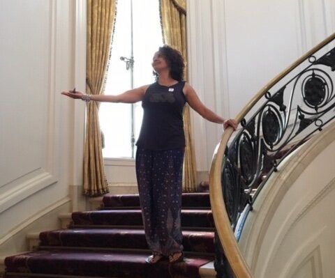 Laura Warrell on a staircase at the Huntington Library, Art Museum and Botanical Gardens in San Marino, California.