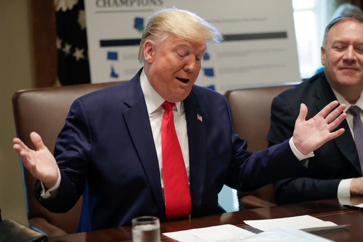 President Donald Trump at a Cabinet meeting Monday at the White House. on the right is Secretary of State Mike Pompeo.