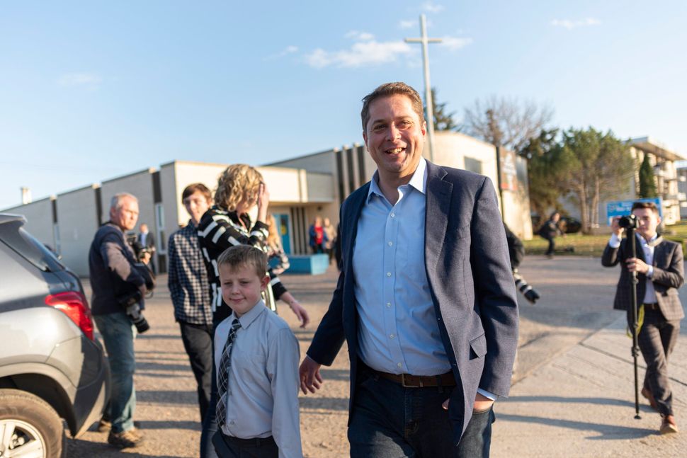 Conservative Leader Andrew Scheer leaves a voting station at Our Lady of Peace Parish on election day in Regina on Oct. 21, 2019.