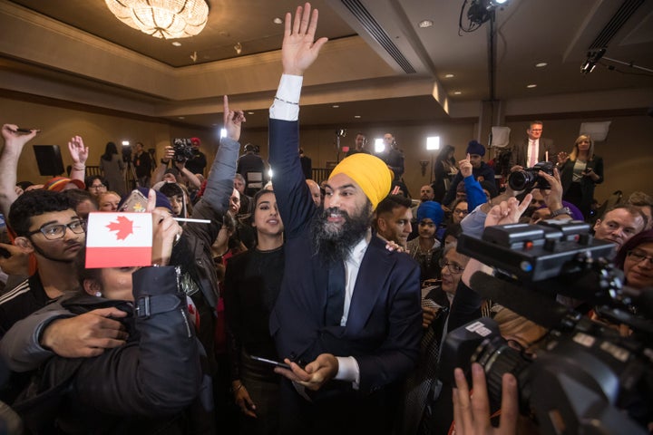 NDP Leader Jagmeet Singh and his wife Gurkiran Kaur Sidhu greet supporters during an election night party in Burnaby, B.C., on Monday October 21, 2019.