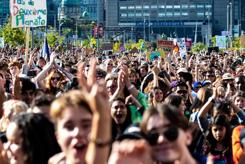 Thousands of protesters march on the streets during the global climate strike in Montreal on Sept. 27, 2019.
