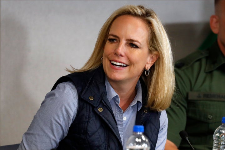 Then-Homeland Security Secretary Kirstjen Nielsen listens to President Donald Trump at a roundtable on immigration and border security at the U.S. Border Patrol Calexico Station in Calexico, California, April 5, 2019. Trump headed to the border with Mexico to make a renewed push for border security as a central campaign issue for his 2020 reelection. (AP Photo/Jacquelyn Martin)