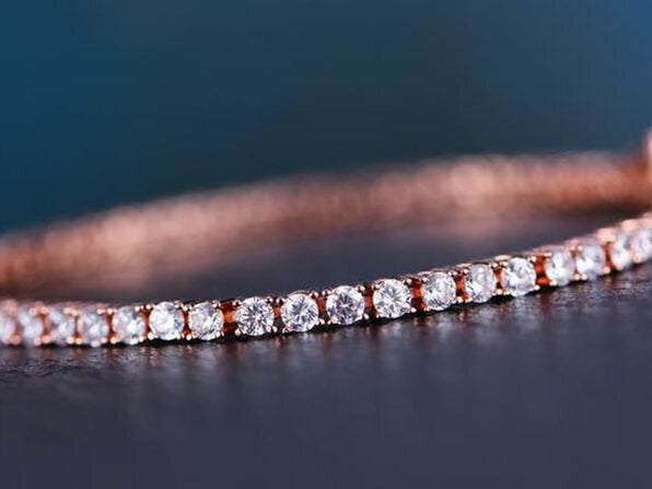 Step up your jewelry game with this <a href="https://www.huffpoststuff.com/sales/white-topaz-swarovski-crystal-3mm-classic-round-tennis-bracelet-gold?utm_source=huffpost.com&utm_medium=referral&utm_campaign=white-topaz-swarovski-crystal-3mm-classic-round-tennis-bracelet-gold&utm_term=scsf-345974&utm_content=a0x1P000004MqL4&scsonar=1" target="_blank" rel="noopener noreferrer">Swarovski crystal classic round tennis bracelet</a>, which is only $20.