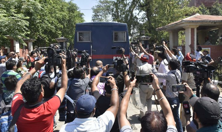 The accused are brought to the district court complex in a police bus on June 10, 2019 in Pathankot, India.