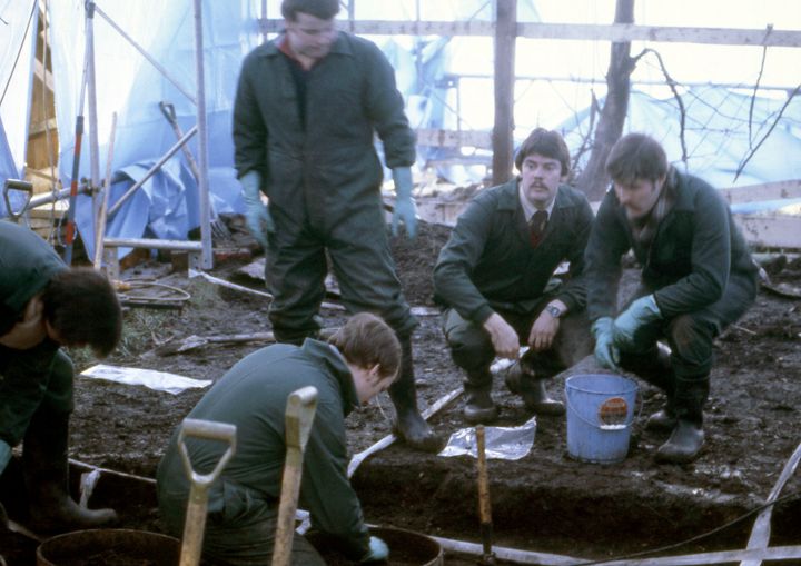 Police digging and sifting through earth for human remains at Nilsen's home in 1983 
