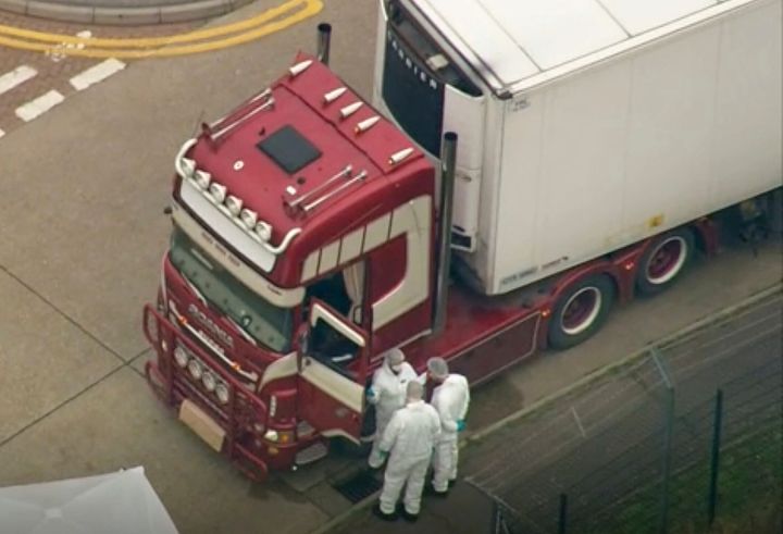 An aerial view as police forensic officers attend the scene after a truck was found to contain a large number of dead bodies, in Thurrock, South England, early Wednesday Oct. 23, 2019. Police in southeastern England said that 39 people were found dead Wednesday inside a truck container believed to have come from Bulgaria. (UK Pool via AP)
