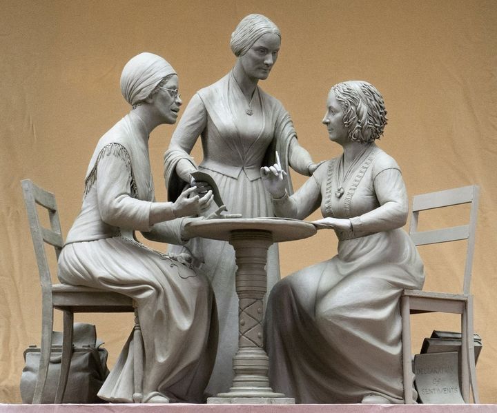 This Oct. 6, 2019 photo provided by Michael Bergmann shows a one-third scale clay model of Sojourner Truth, left, Susan B. Anthony, center, and Elizabeth Cady Stanton at Meredith Bergmann's studio in Ridgefield, Conn. A New York City commission voted Monday, Oct. 21 to erect a tribute to the three civil rights pioneers. Meredith Bergmann's work is to be dedicated next August in Central Park, marking the 100th anniversary of women's suffrage in the United States. 