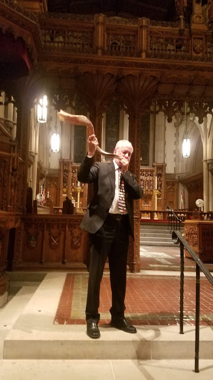 Rabbi Jeffrey Myers blowing the shofar the week before Rosh Hashanah inside of Calvary Church, the Episcopal Church that hosted the holidays for Tree of Life in 2019.