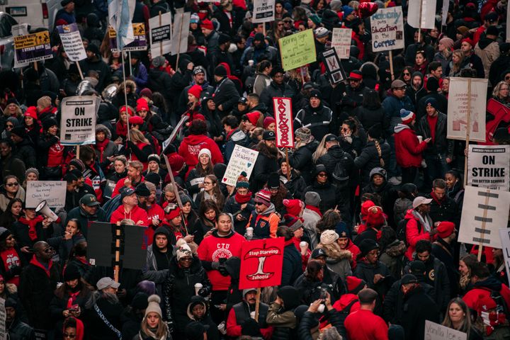 Thousands of demonstrators circle Chicago City Hall in a show of support for the ongoing teachers strike on Oct. 23, 2019. Unionized teachers and staff are demanding more funding from the city to lower class sizes, hire more support staff and build new affordable housing for the 16,000 students whose families are homeless. 