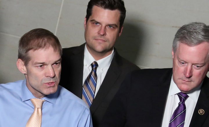 Reps. Jim Jordan (R-Ohio), left, Gaetz and Mark Meadows (R-N.C.), right, speak to reporters outside the House Intelligence Co
