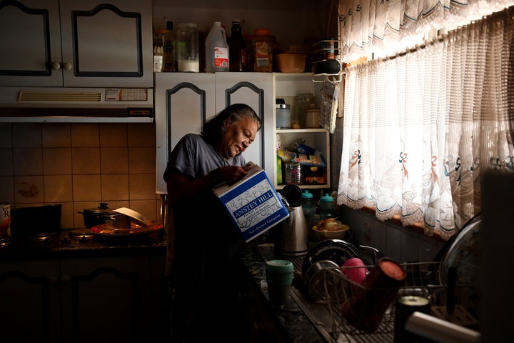 Barkindji elder Patricia Doyle uses boxed water to make a cup of tea at her home in Menindee, New South Wales, Australia, September 29, 2019.